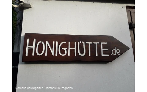 Wegweiser zur Honighütte
